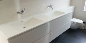 Glacier white Corian basins