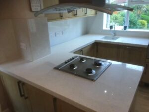 white sparkles quartz overlay worktop
